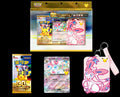 Pokémon 30th Anniversary Celebration set featuring a large blister pack with trading cards and a pink sylveon keychain, plus two smaller individual packs and a single card displayed on a black background.